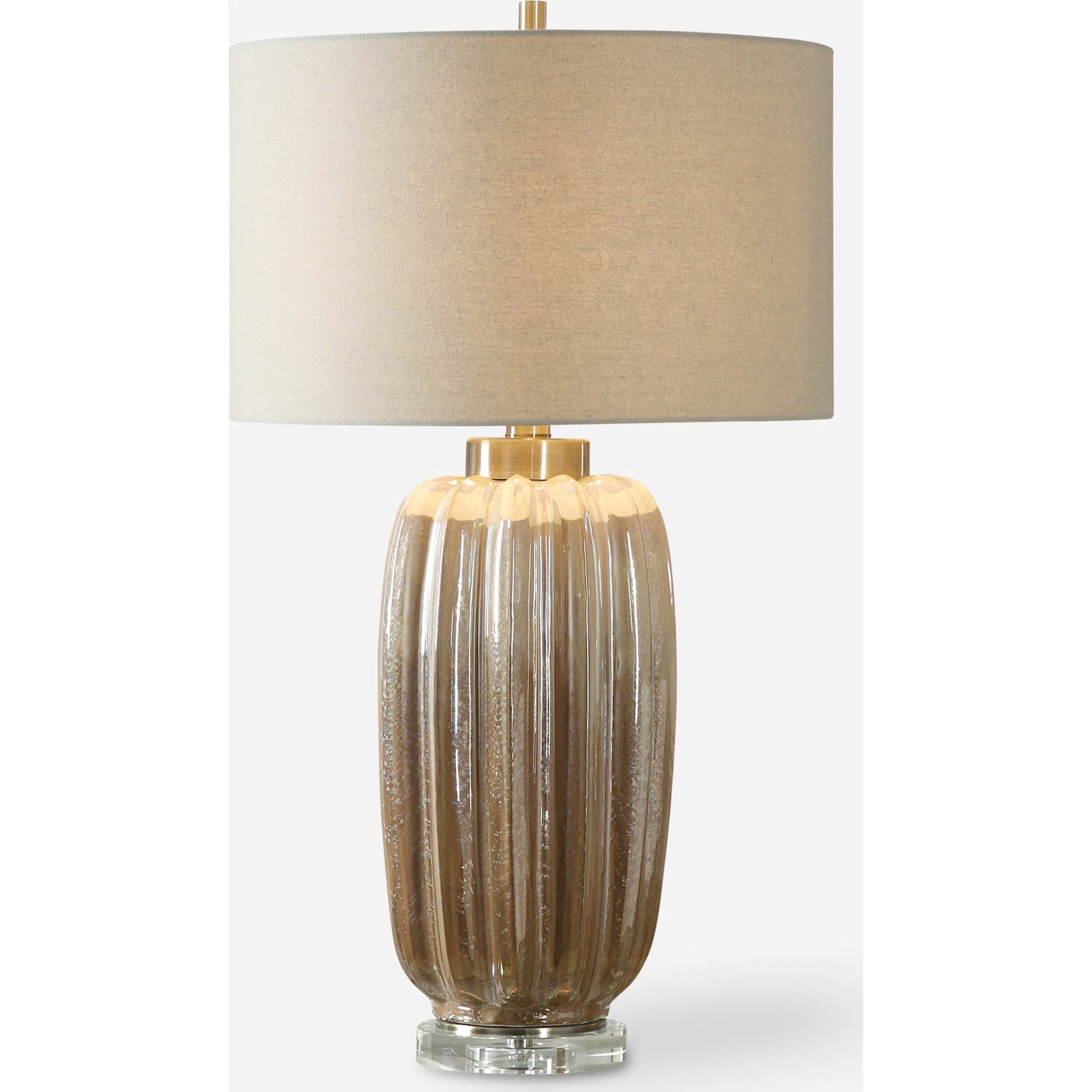 Gistova Table Lamp by Uttermost in gold. Made from steel, ceramic, crystal in a modern style.