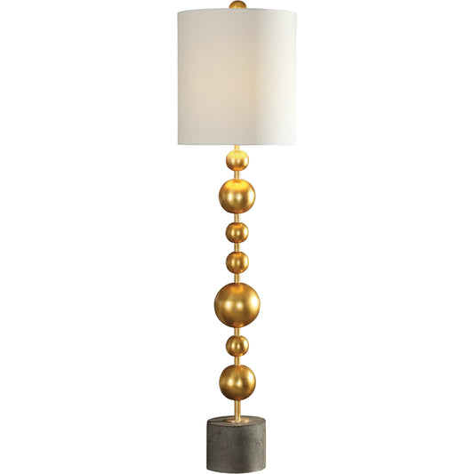 Selim Buffet Lamp by Uttermost in gold. Made from metal, concrete, fabric in a modern style.