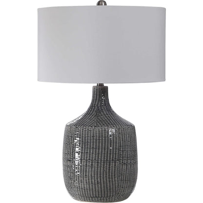 Felipe Table Lamp by Uttermost in light gray. Made from ceramic, iron, fabric in a eclectic & global style.