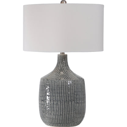 Felipe Table Lamp by Uttermost in light gray. Made from ceramic, iron, fabric in a eclectic & global style.