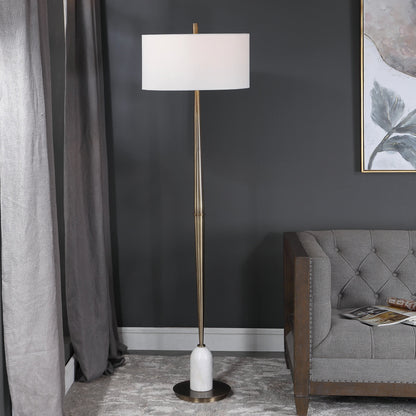 Minette Floor Lamp by Uttermost in antique brass. Made from steel, marble, fabric in a modern style.