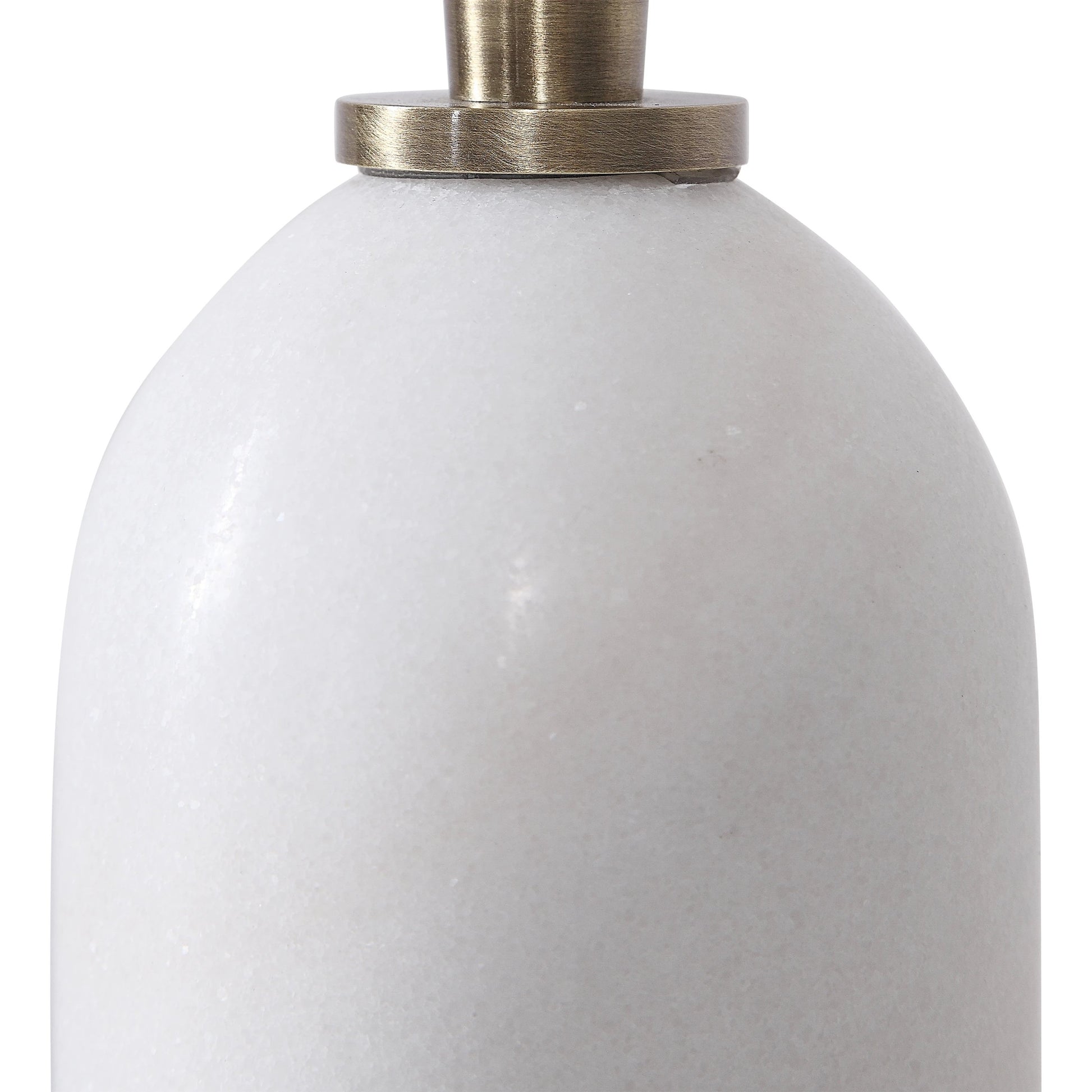 Minette Buffet Lamp by Uttermost in antique brass. Made from steel, marble, fabric in a modern style.