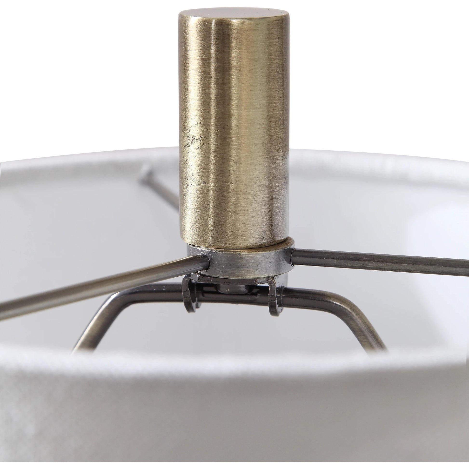 Minette Buffet Lamp by Uttermost in antique brass. Made from steel, marble, fabric in a modern style.