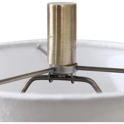 Minette Buffet Lamp by Uttermost in antique brass. Made from steel, marble, fabric in a modern style.