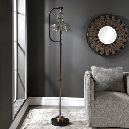 Elieser Floor Lamp by Uttermost in antique brass. Made from steel, glass in a modern style.