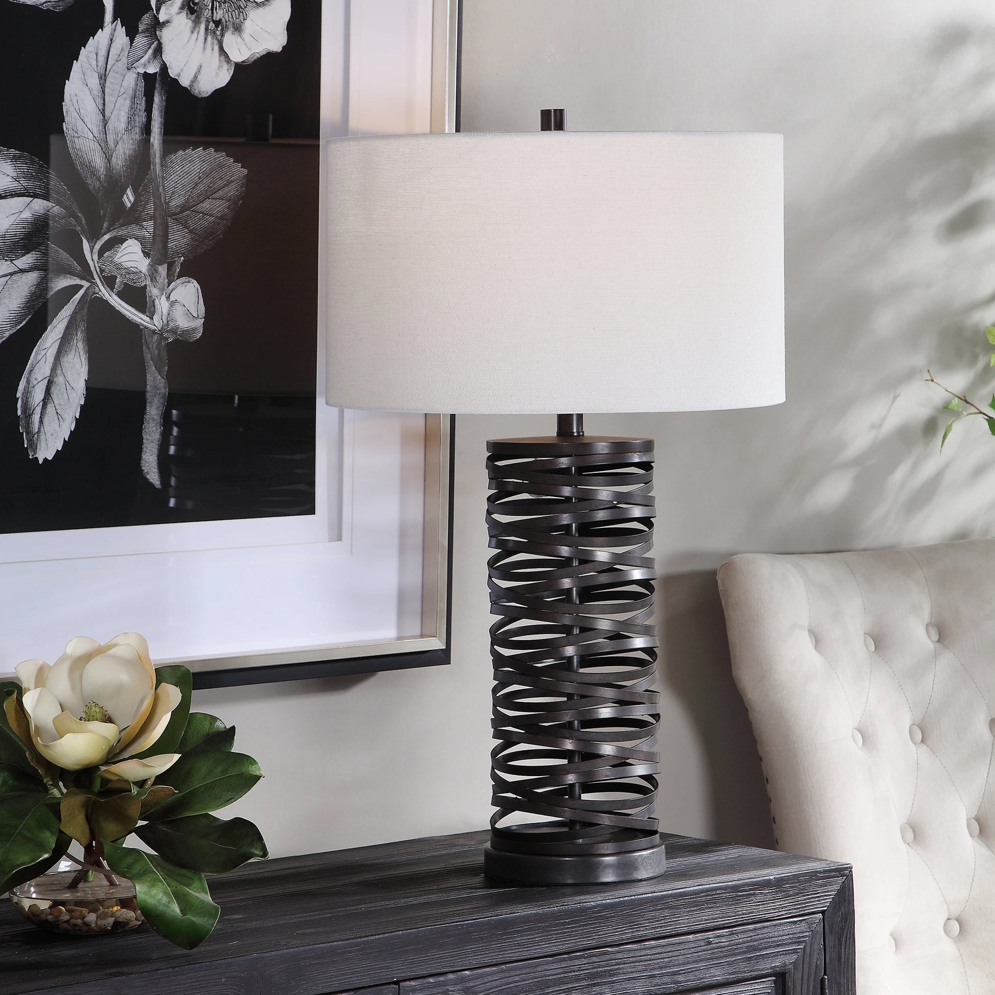 Alita Table Lamp by Uttermost in rust black. Made from steel, fabric in a modern style.
