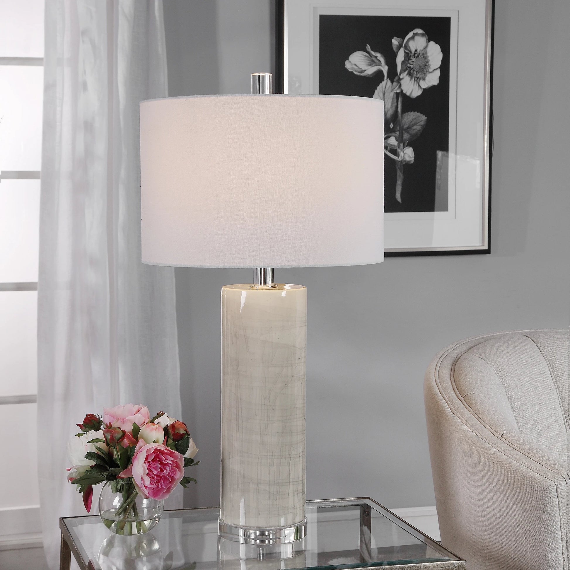 Zesiro Table Lamp by Uttermost in beige. Made from ceramic, crystal, fabric, steel in a modern style.