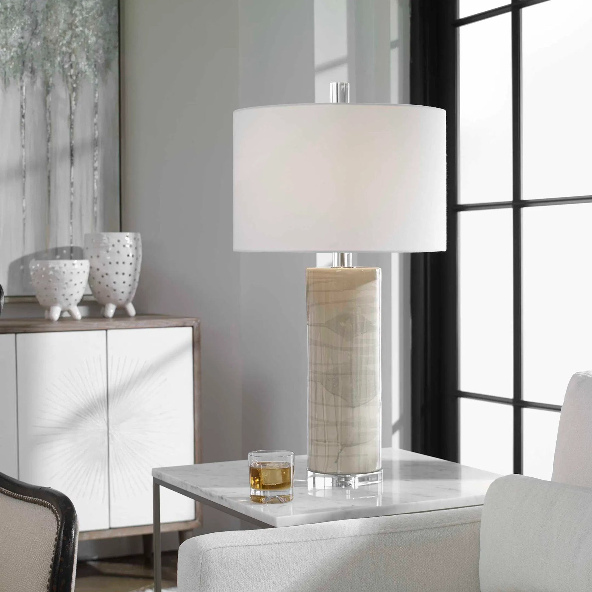 Zesiro Table Lamp by Uttermost in beige. Made from ceramic, crystal, fabric, steel in a modern style.