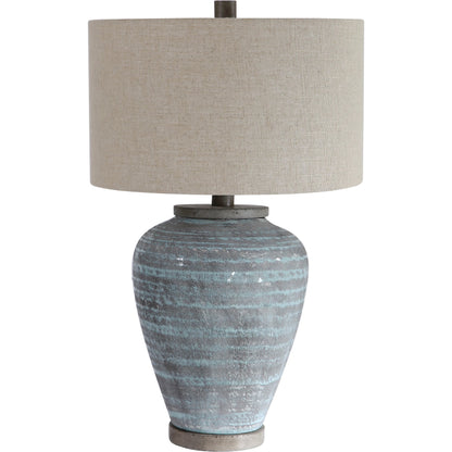 Pelia Table Lamp by Uttermost in aqua. Made from ceramic, resin, fabric in a coastal style.