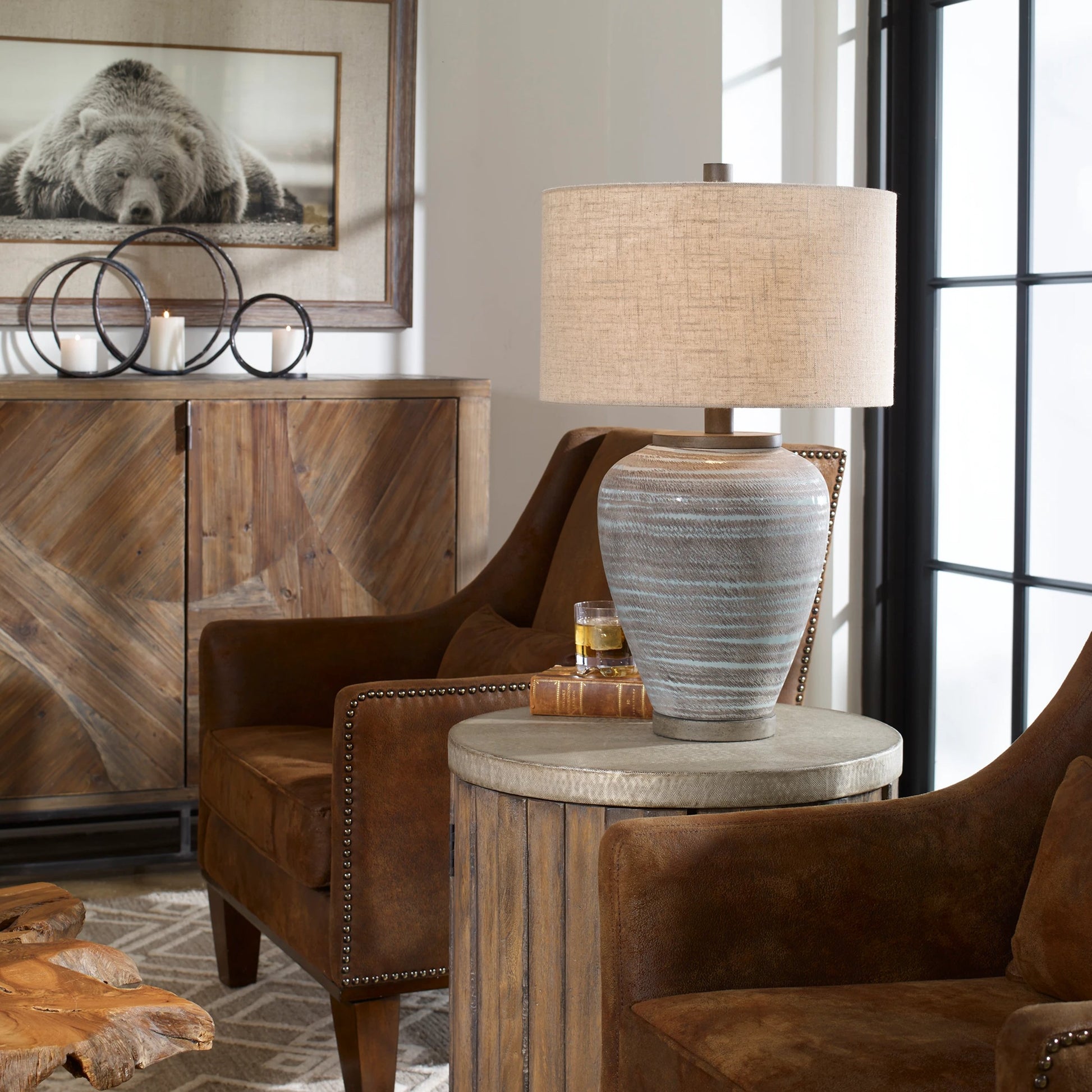 Pelia Table Lamp by Uttermost in aqua. Made from ceramic, resin, fabric in a coastal style.