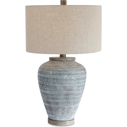 Pelia Table Lamp by Uttermost in aqua. Made from ceramic, resin, fabric in a coastal style.