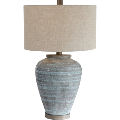 Pelia Table Lamp by Uttermost in aqua. Made from ceramic, resin, fabric in a coastal style.
