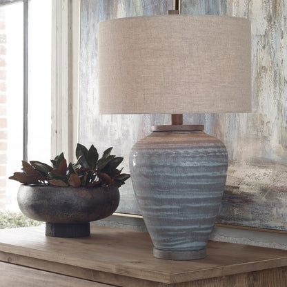 Pelia Table Lamp by Uttermost in aqua. Made from ceramic, resin, fabric in a coastal style.