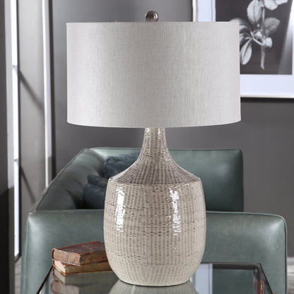 Felipe Table Lamp by Uttermost in light gray. Made from ceramic, iron, fabric in a eclectic & global style.
