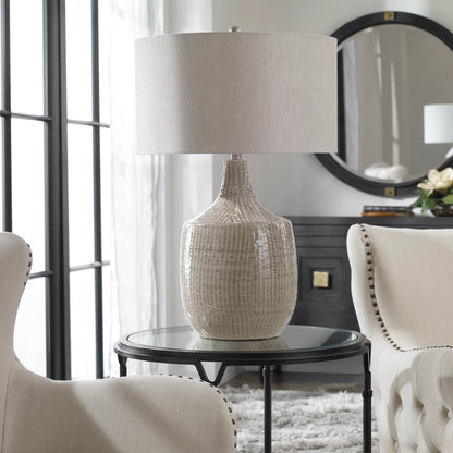 Felipe Table Lamp by Uttermost in light gray. Made from ceramic, iron, fabric in a eclectic & global style.