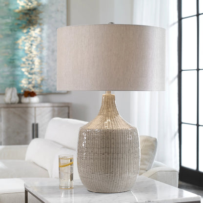 Felipe Table Lamp by Uttermost in light gray. Made from ceramic, iron, fabric in a eclectic & global style.