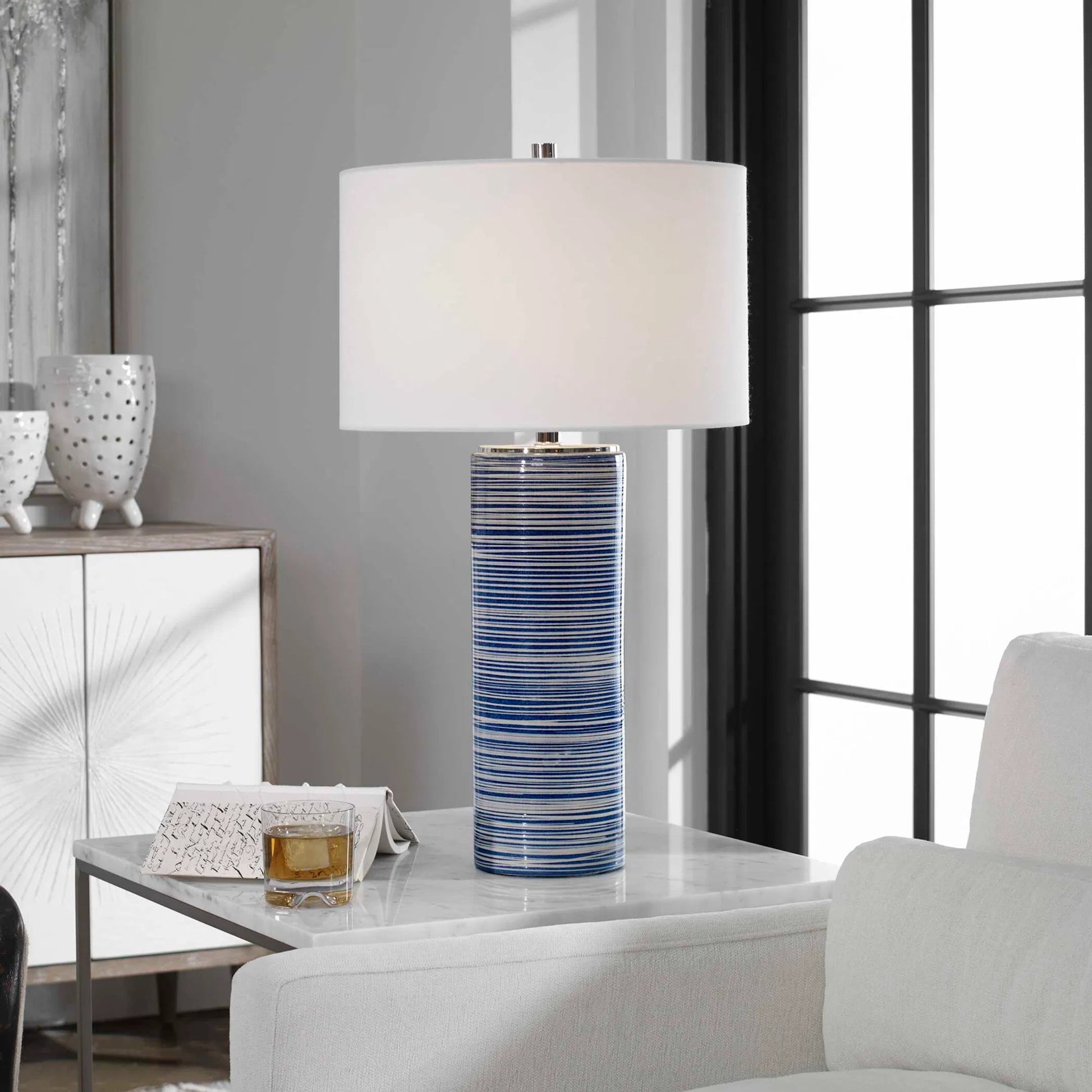 Montauk Striped Table Lamp by Uttermost. Made from ceramic, steel, fabric in a coastal style.