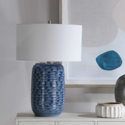 Sedna Table Lamp by Uttermost in blue. Made from medium temperature ceramic, iron in a coastal style.