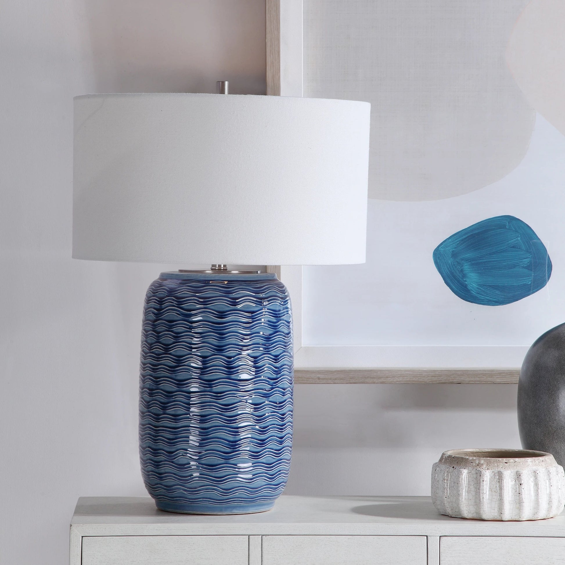 Sedna Table Lamp by Uttermost in blue. Made from medium temperature ceramic, iron in a coastal style.