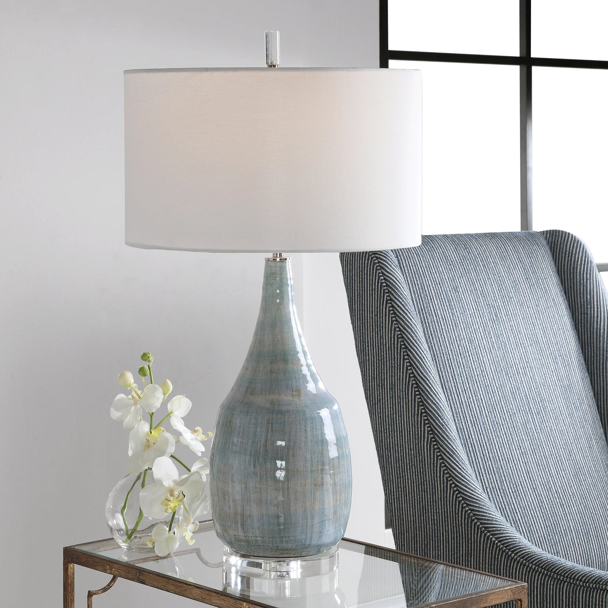 Rialta Coastal Table Lamp by Uttermost. Made from steel, ceramic, crystal in a coastal style.
