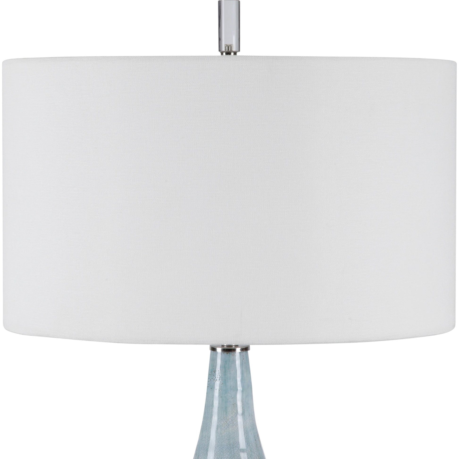 Rialta Coastal Table Lamp by Uttermost. Made from steel, ceramic, crystal in a coastal style.