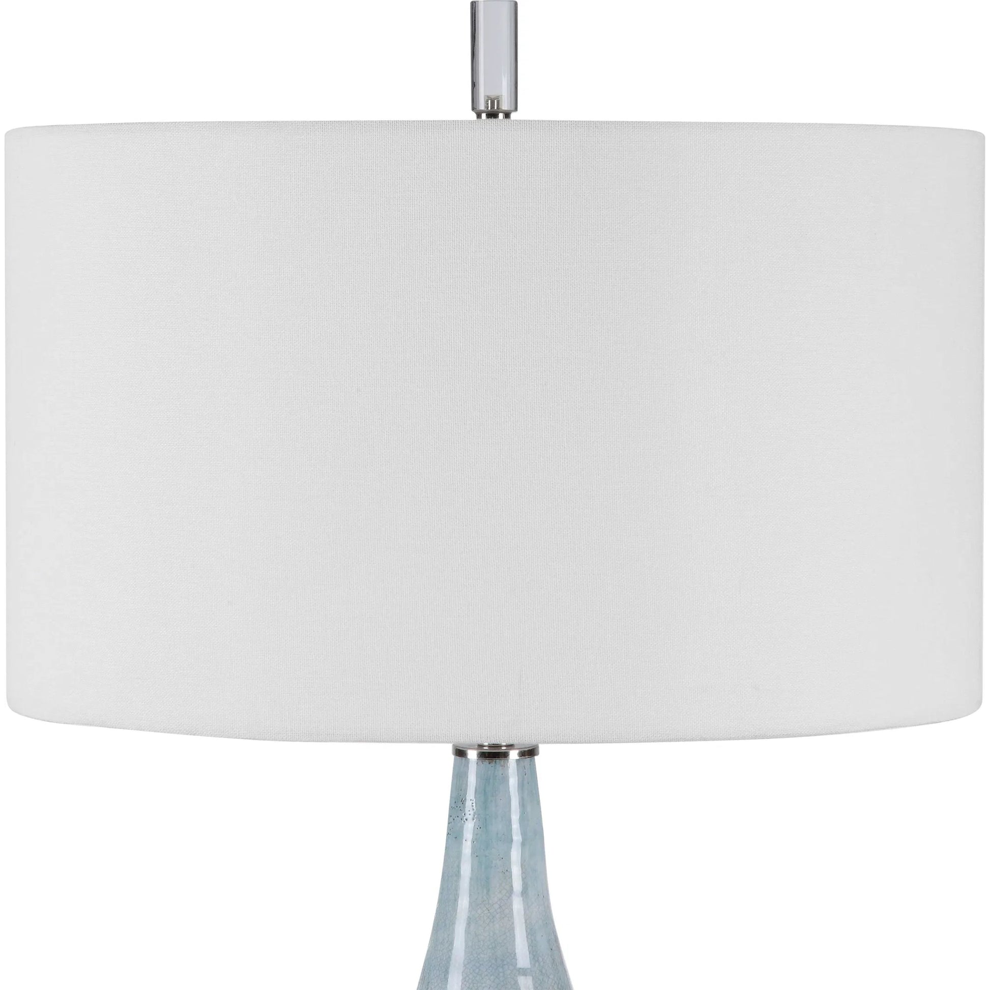 Rialta Coastal Table Lamp by Uttermost. Made from steel, ceramic, crystal in a coastal style.