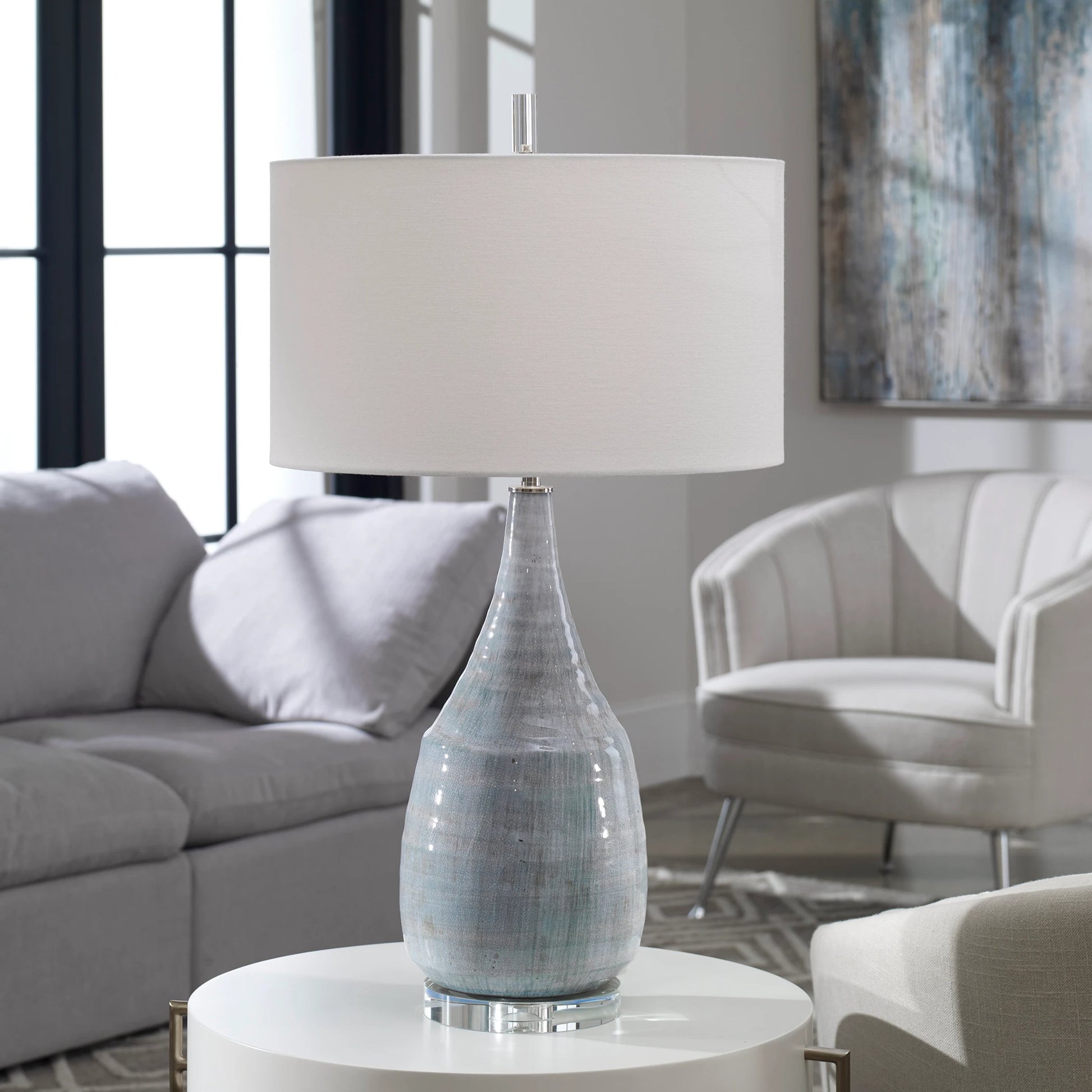 Rialta Coastal Table Lamp by Uttermost. Made from steel, ceramic, crystal in a coastal style.