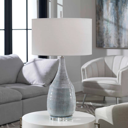 Rialta Coastal Table Lamp by Uttermost. Made from steel, ceramic, crystal in a coastal style.