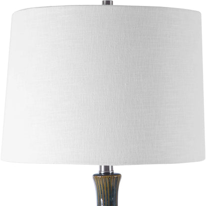 Eichler Mid-Century Table Lamp by Uttermost. Made from ceramic, fabric, iron in a coastal style.