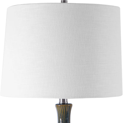 Eichler Mid-Century Table Lamp by Uttermost. Made from ceramic, fabric, iron in a coastal style.