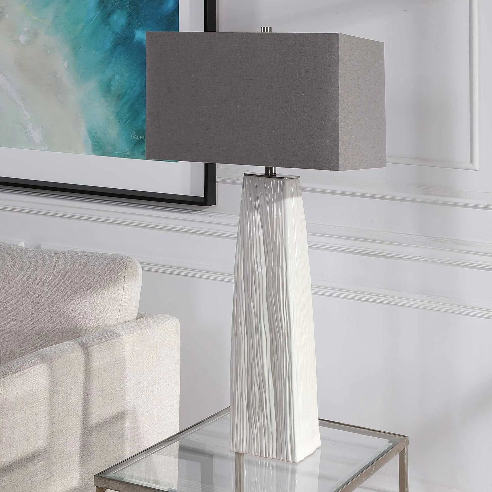 Sycamore Table Lamp by Uttermost in white. Made from ceramic, iron, fabric in a transitional style.