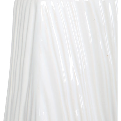 Sycamore Table Lamp by Uttermost in white. Made from ceramic, iron, fabric in a transitional style.