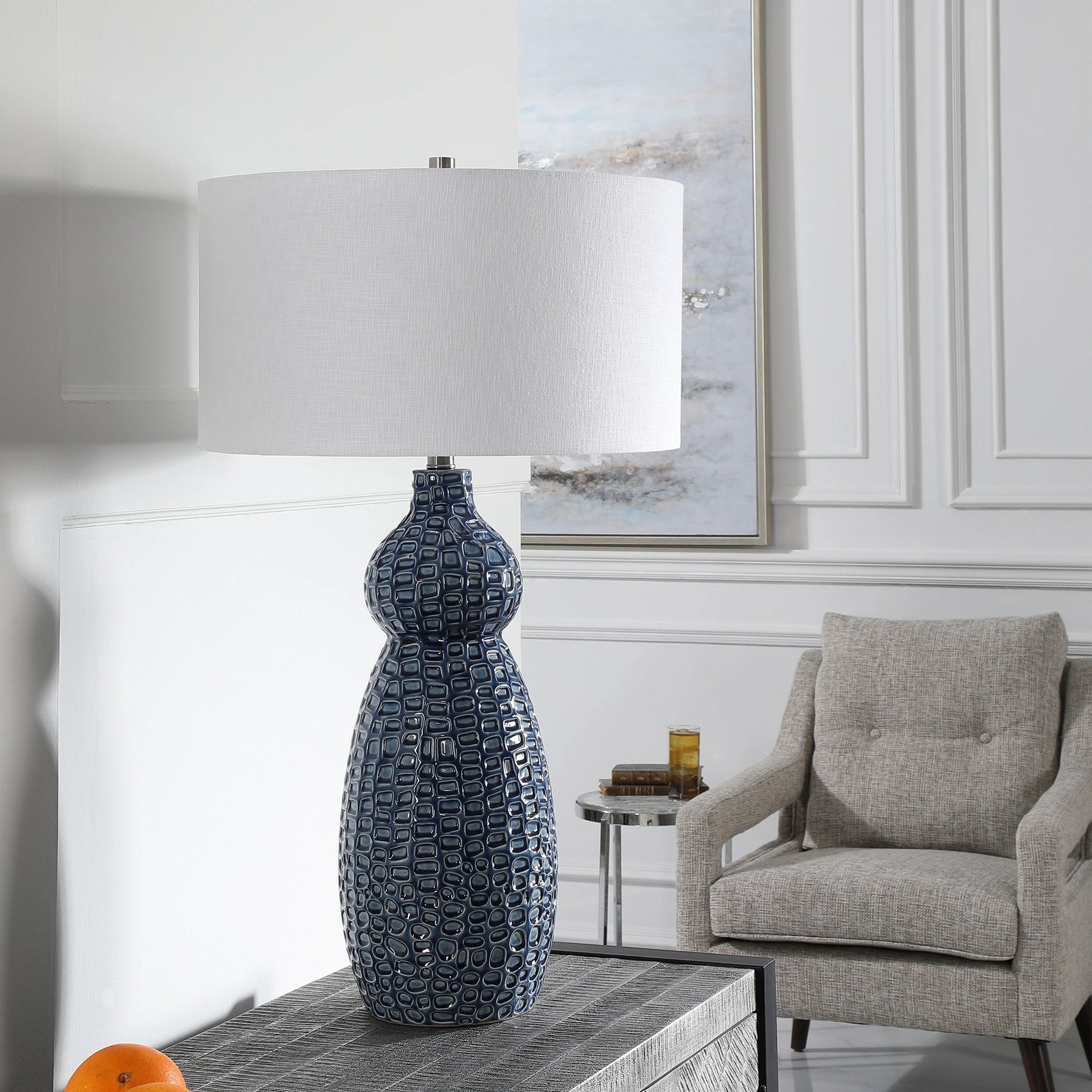 Holloway Table Lamp by Uttermost in blue. Made from ceramic, iron, fabric in a transitional style.