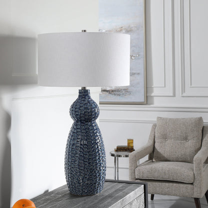 Holloway Table Lamp by Uttermost in blue. Made from ceramic, iron, fabric in a transitional style.