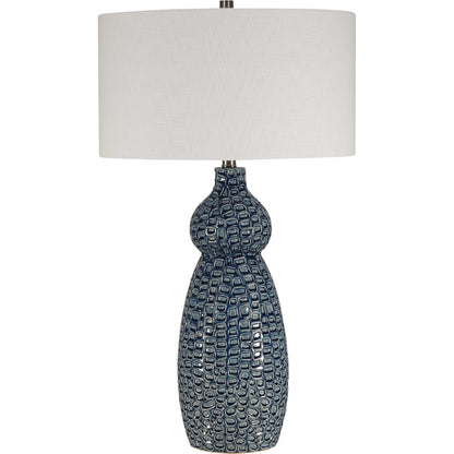 Holloway Table Lamp by Uttermost in blue. Made from ceramic, iron, fabric in a transitional style.