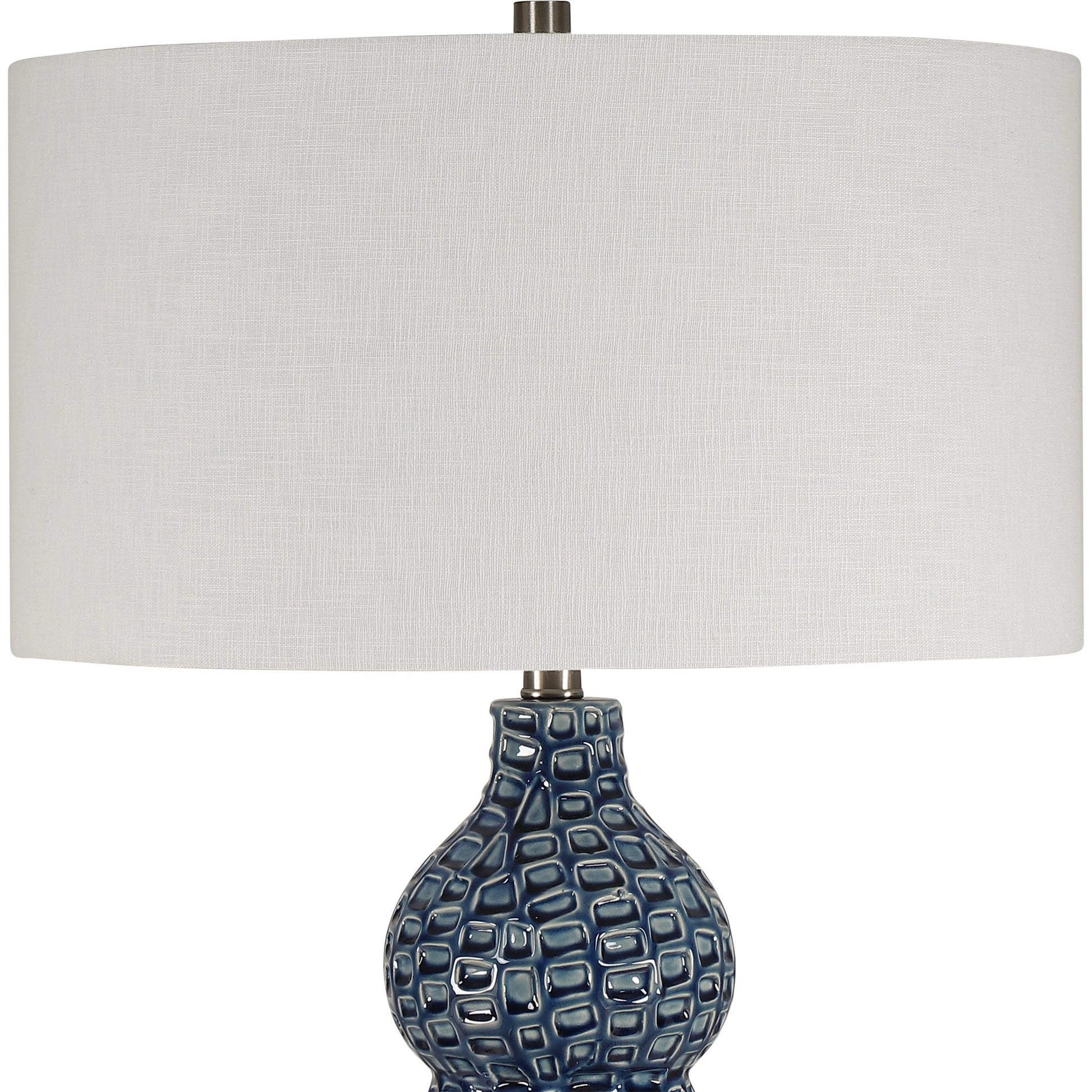 Holloway Table Lamp by Uttermost in blue. Made from ceramic, iron, fabric in a transitional style.