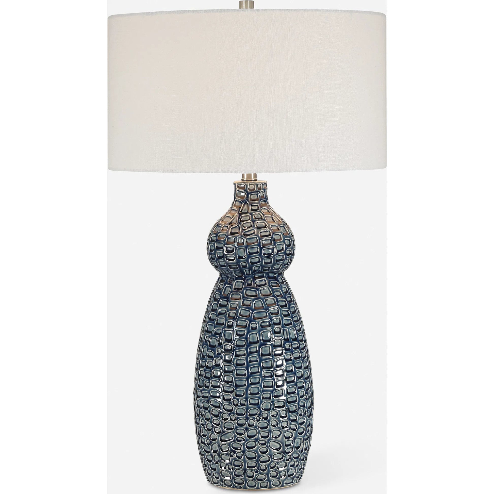 Holloway Table Lamp by Uttermost in blue. Made from ceramic, iron, fabric in a transitional style.