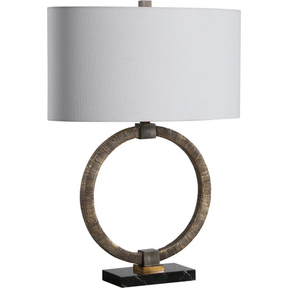 Relic Aged Table Lamp by Uttermost in gold. Made from resin, marble, iron, fabric in a eclectic & global style.
