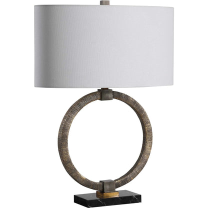 Relic Aged Table Lamp by Uttermost in gold. Made from resin, marble, iron, fabric in a eclectic & global style.