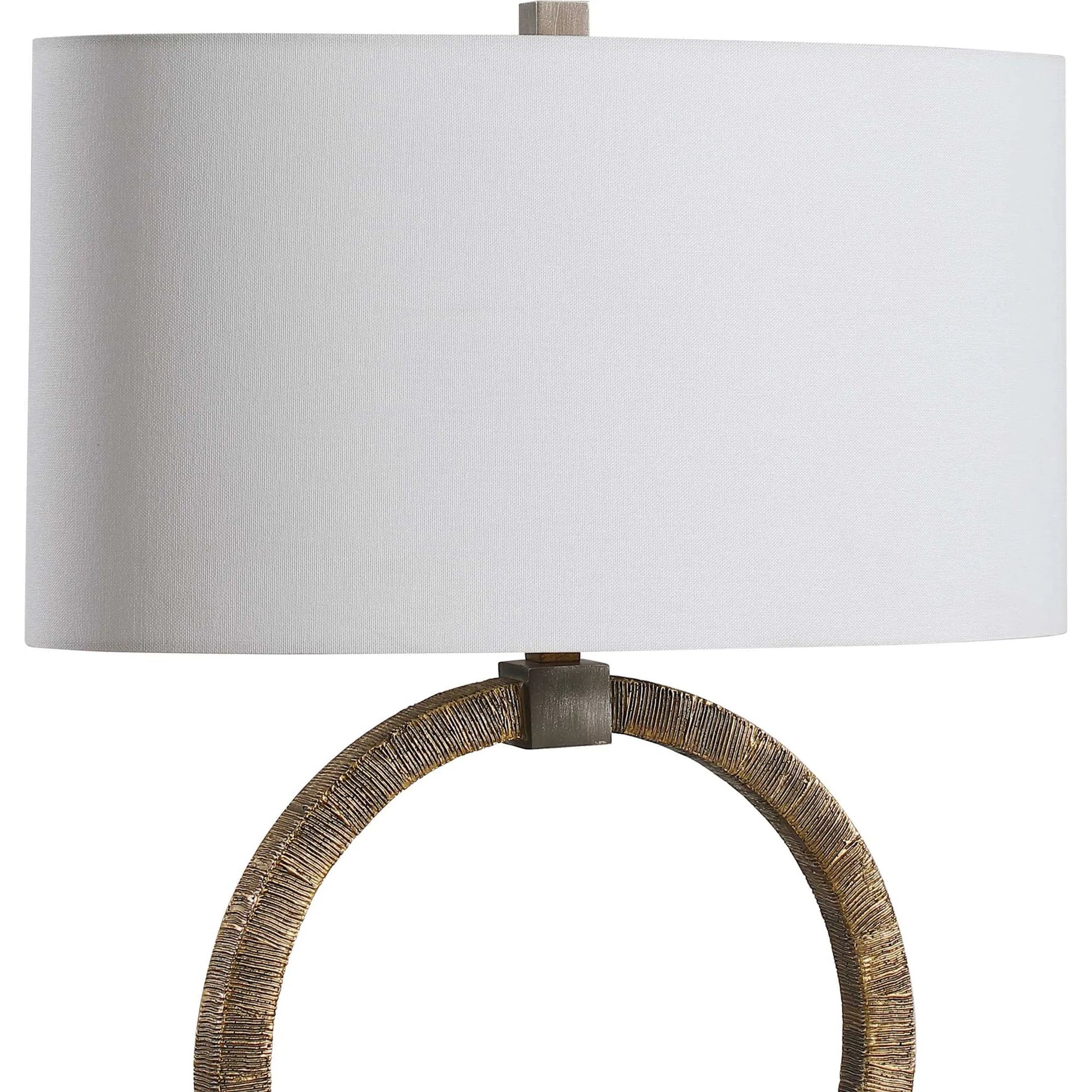 Relic Aged Table Lamp by Uttermost in gold. Made from resin, marble, iron, fabric in a eclectic & global style.