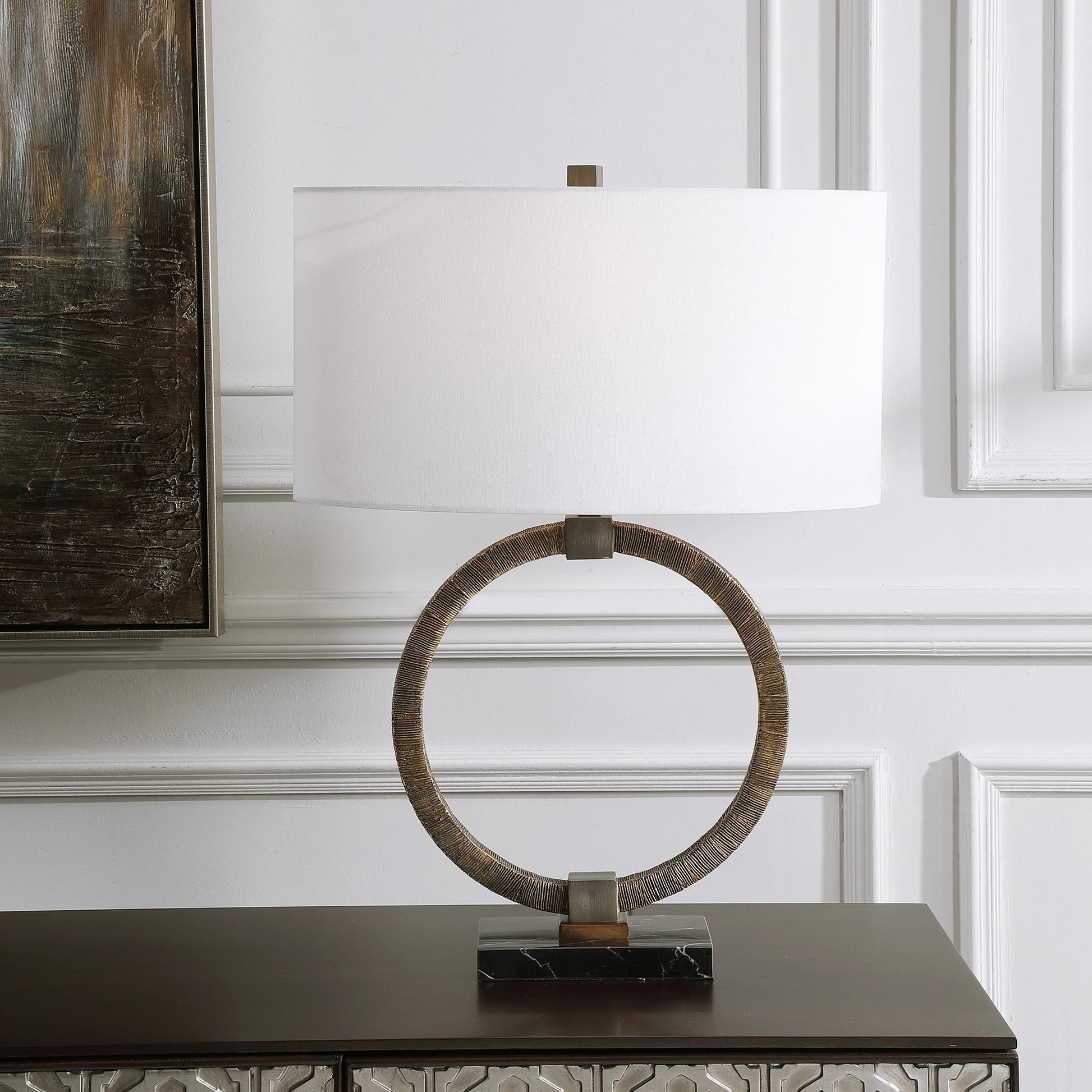 Relic Aged Table Lamp by Uttermost in gold. Made from resin, marble, iron, fabric in a eclectic & global style.