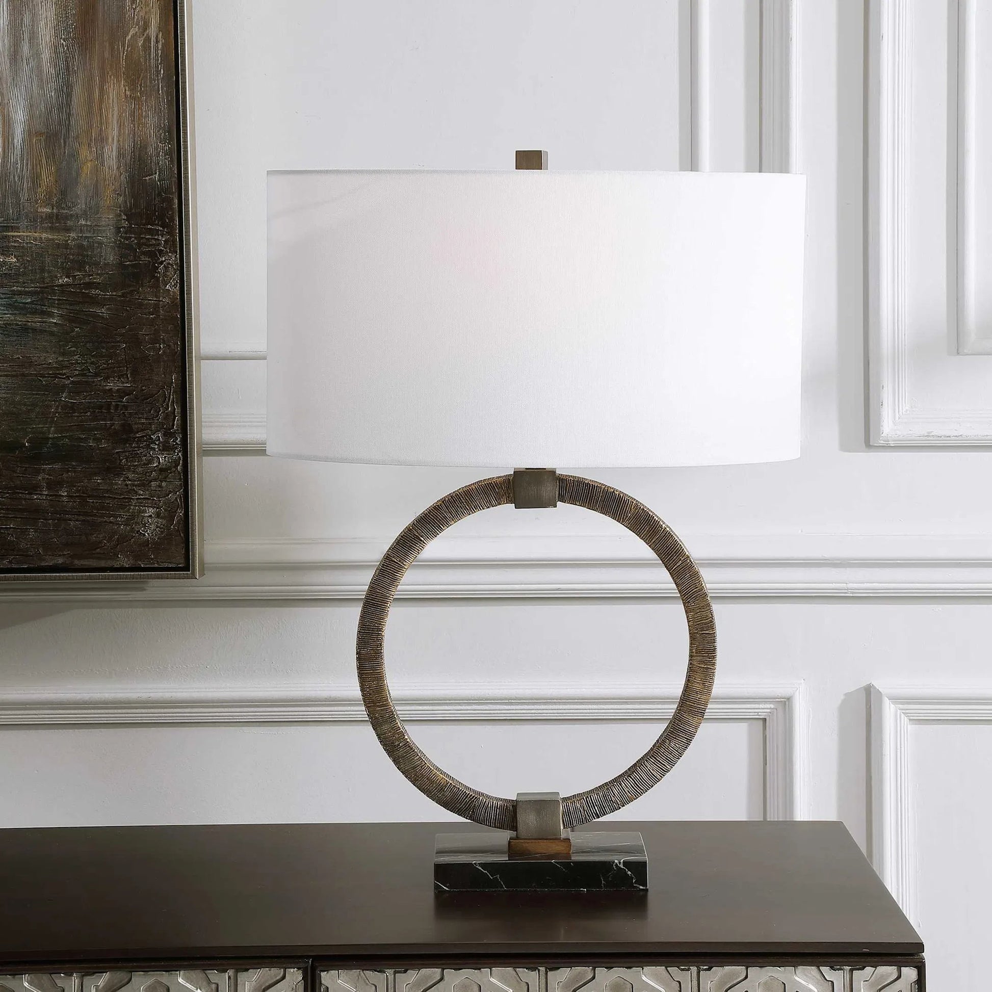Relic Aged Table Lamp by Uttermost in gold. Made from resin, marble, iron, fabric in a eclectic & global style.