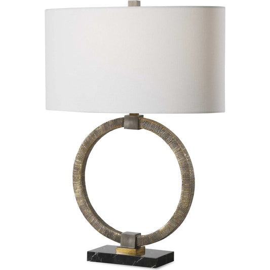 Relic Aged Table Lamp by Uttermost in gold. Made from resin, marble, iron, fabric in a eclectic & global style.