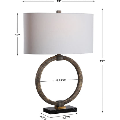 Relic Aged Table Lamp by Uttermost in gold. Made from resin, marble, iron, fabric in a eclectic & global style.