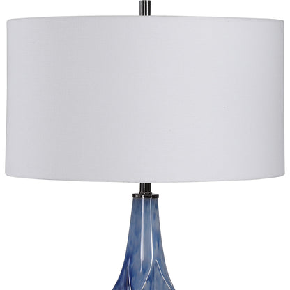 Everard Table Lamp by Uttermost in blue. Made from porcelain, crystal, iron, fabric in a modern style.