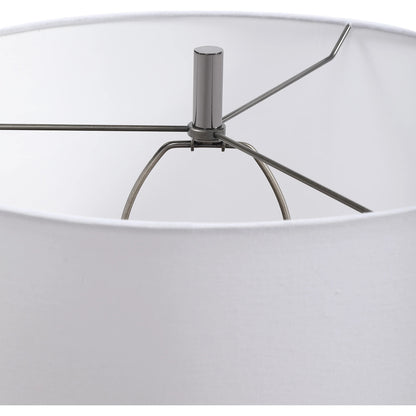 Everard Table Lamp by Uttermost in blue. Made from porcelain, crystal, iron, fabric in a modern style.