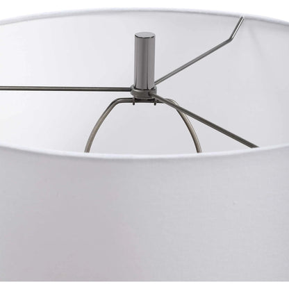 Everard Table Lamp by Uttermost in blue. Made from porcelain, crystal, iron, fabric in a modern style.