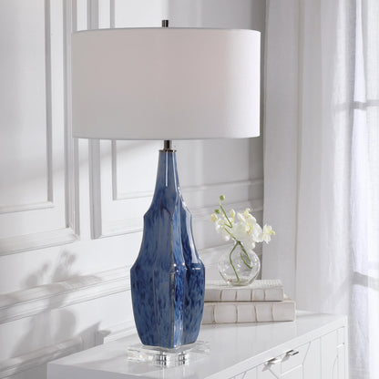 Everard Table Lamp by Uttermost in blue. Made from porcelain, crystal, iron, fabric in a modern style.