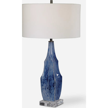 Everard Table Lamp by Uttermost in blue. Made from porcelain, crystal, iron, fabric in a modern style.