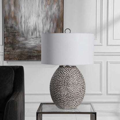 Cyprien Table Lamp by Uttermost in gray. Made from iron, ceramic, fabric in a modern style.
